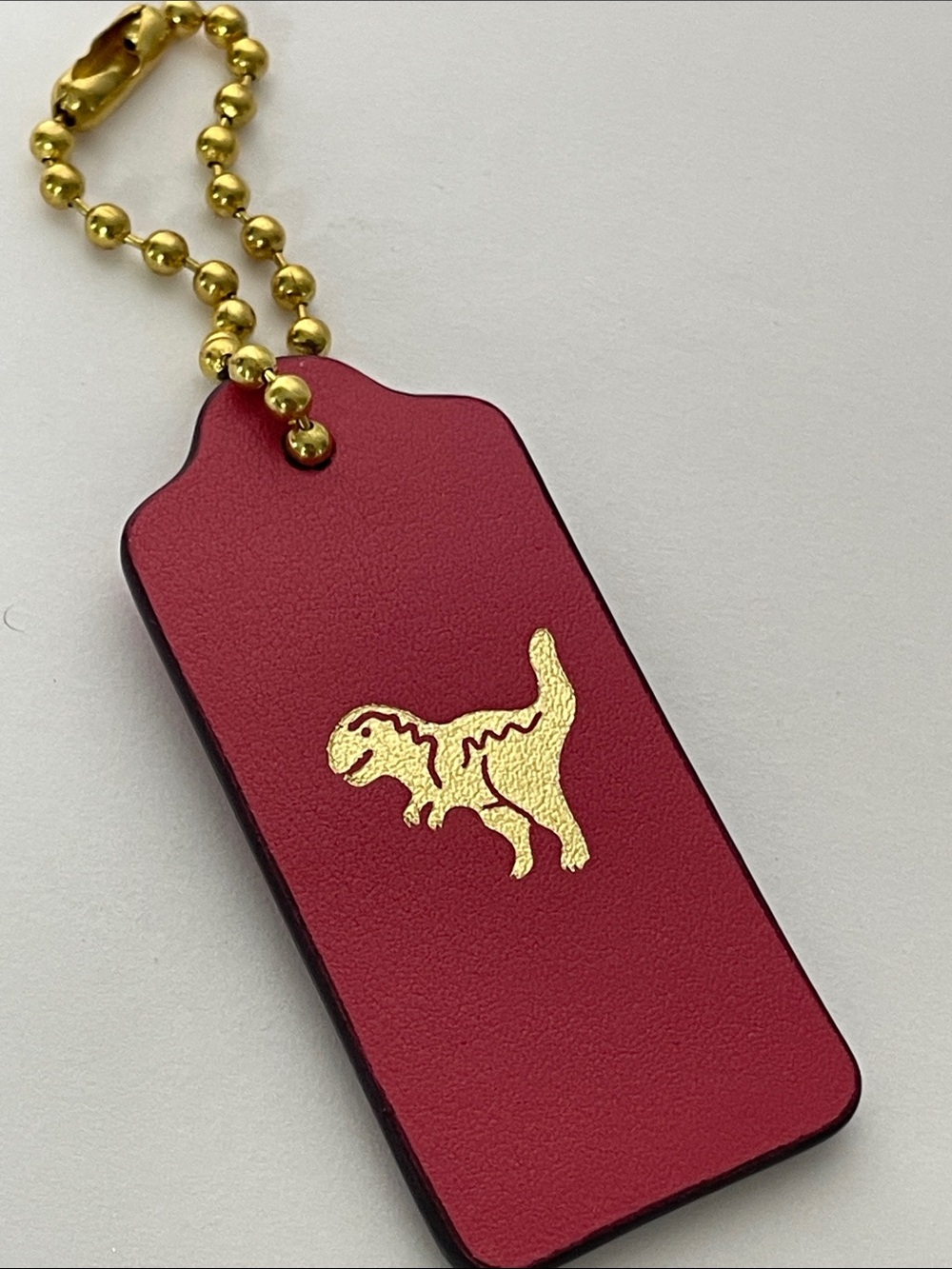 NWOT Coach Gold Foil Rexy Hang Tag Key Fob Hangtag